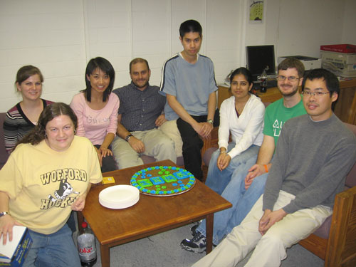 The group celebrates Dr. Gong's birthday