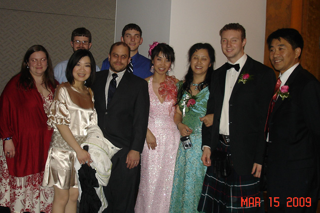 Group members celebrate at Meng's wedding